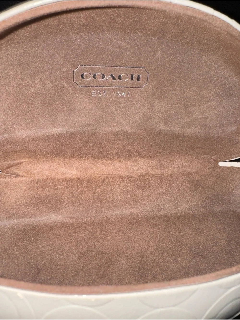 Coach cream embossed
